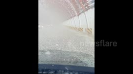 China: A Grassland Covered with Snow in Summer