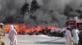 Trucks turn to ash as customs' parking lot catches fire in western Afghan city