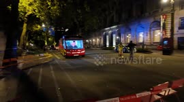 Firefighters start to get ready to depart from Somerset House after putting out the fire