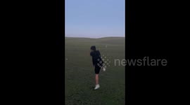 China: A man wanted to record a cool jump video on the grass, but the ground was too slippery and he ended up falling flat on his face