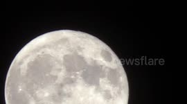 USA: Super Moon rises over the city
