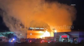 USA: Palmdale 2 Burning Tractor Trailers Expose Furniture Store to Flames