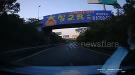 Blazing Audi A4 leaves ghost rider style trail of fire on Chinese expressway