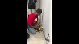 Worker uses DIY skills to rescue kitten trapped behind wall