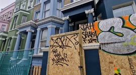 Notting Hill businesses and residents board up properties in preparation of Notting Hill Carnival during the Bank Holiday Weekend