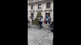 Silver man in Covent garden objects to being filmed