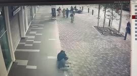 Firemen battle to rescue shopper swallowed by pavement sinkhole in Malaysia