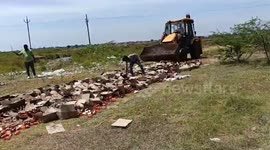 Illegal liquor worth lakhs destroyed by Excavator in southern India