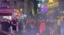 Revellers fill streets of Soho on bank holiday Saturday