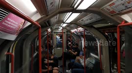 People from Notting Hill Carnival party on the Central Line