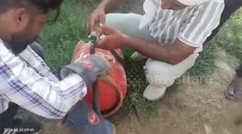 Cobra with head stuck in gas cylinder snake catcher rescue in Haryana, India