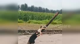 China: Mother and Daughter Cling to Power Line Pole for Life After Car Swept into River in Inner Mongolia