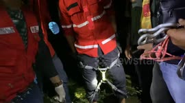Joint Officers Evacuate a Man from the Sutet Tower in Agam Regency, West Sumatra