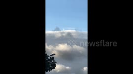 Chinese residents in awe at human-shaped object 'walking along skyline'