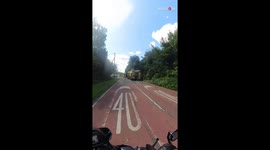 Man drives through crash site following a major collision between Tesla and Fiat 500