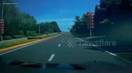 China:  A Plane Having a Hard Landing on Highway