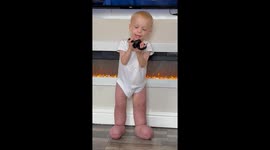 Video shows child singing happily despite disability