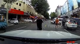 Strong winds sending shop billboard crashing onto passing cars in eastern China