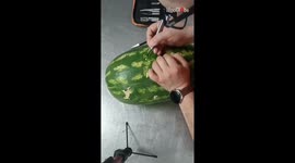 Dedicated fan's artistic tribute to Burak Özçivit on a watermelon canvas