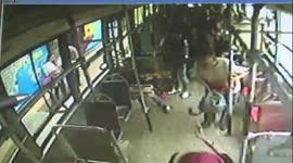 Man throws stone in an attempt to smash bus window