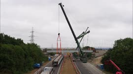 Engineers crane in improvements to A249 Grovehurst interchange in Kent, UK
