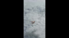 Reconnaissance plane roars over Barnaul before Russian Knights flyby