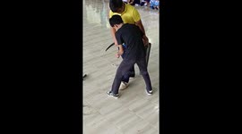 Trouser snake! Cobra climbs into teacher's PANTS during school demonstration