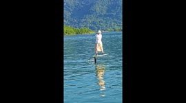 Chinese woman balances on hydrofoil