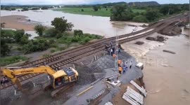 Flood effects restoration works of damaged Rail tracks between Intikanne- Kesamudram section are being carried out by the Railway officials on war footing in South India