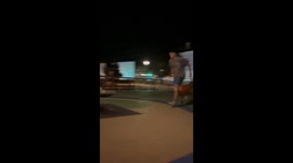 Person jumps and bounces off metal fence in Madrid, Spain