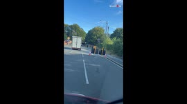 Van collides with low bridge after driver ignores height restrictions