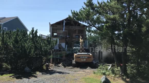 Case Excavator Tearing Down a Dewey Beach, Delaware USA house