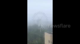 Ferris wheel cabins violently shake as super typhoon batters southern China