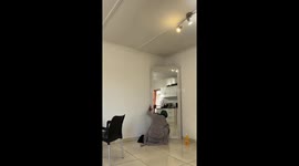 Mirror shatters after the girl places it imperfectly in the corner of home