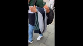 Man Uses Raw Chicken As A Hat