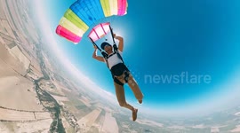Skydiver skilfully catches hat that fell off at 3,500feet in the air