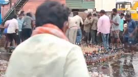 Chaos as drunkards steal seized alcohol as Indian police were in process of destroying it