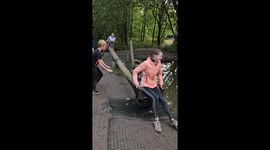 Girl dunked in paddle while on seesaw in Chester, UK