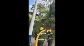 Firefighters use ice to cool down teammate after battling fire