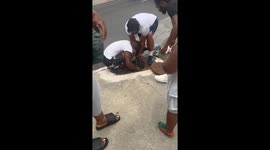 Little girl drops her iPad into the sewer and a stranger recovers it