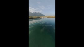 Early morning. Mirror watter. Lofoten. Norway. Fpv cinematic.