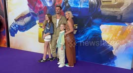Beau Ryan and Kara Ryan attend the Australian Premiere of Transformers One red carpet
