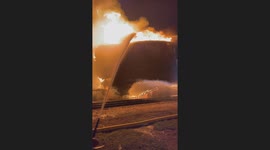 Controlled burn goes awry as old coop elevator collapses onto railroad tracks in Whittemore, Iowa