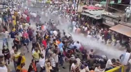 Riot police fire water cannon on Hindus protesting over illegal mosque