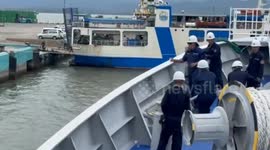 Philippine Coast Guard ship withdraws from contested reef amid South China Sea standoff