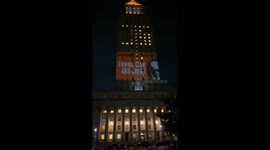 Anti-Trump protesters project a slideshow on the Thurgood Marshall United States Courthouse in Manhattan's Civic Center's Foley Square.