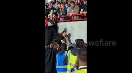 Leyton Orient fans clash with stewards at Brentford's stadium in league cup defeat
