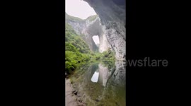 China: Amazing Reflection of Mountain And Caves