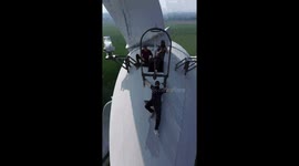 VIDEO: Man climbs WIND TURBINE to touch moving blades in shocking video (part 2)