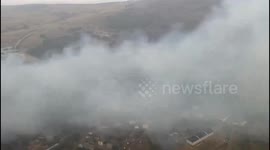 Spain: Firefighters Confront Forest Fire in Lucillo, Leon